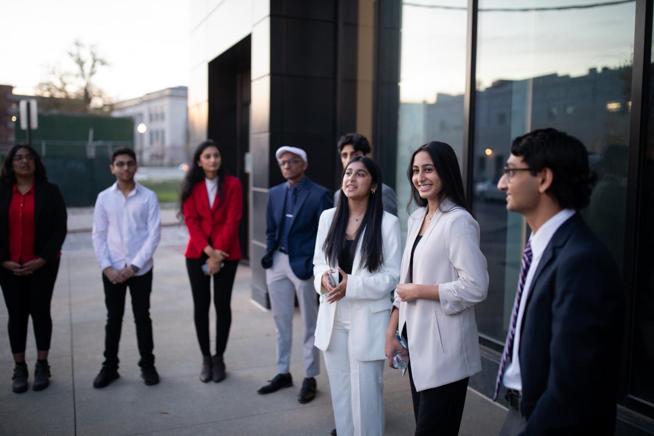 BOSS students interact outside the event venue