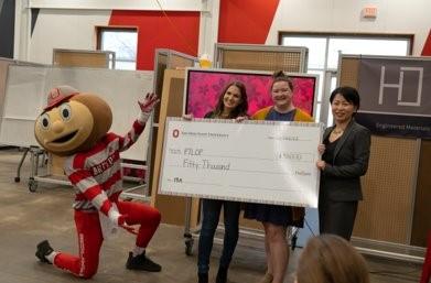 Image For the Love of Primates at pitch finale with check, Brutus and Grace Wang