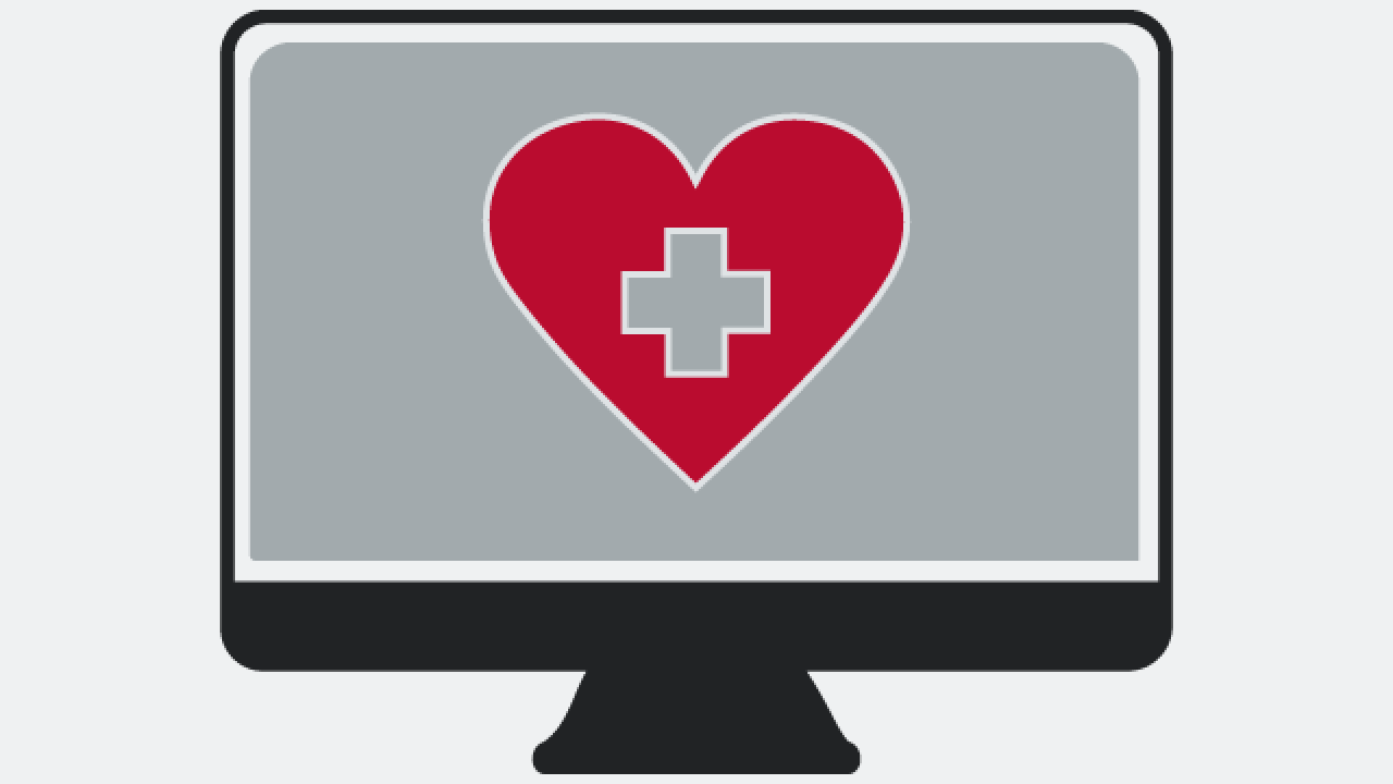 Graphic of monitor with red heart and cross in the middle