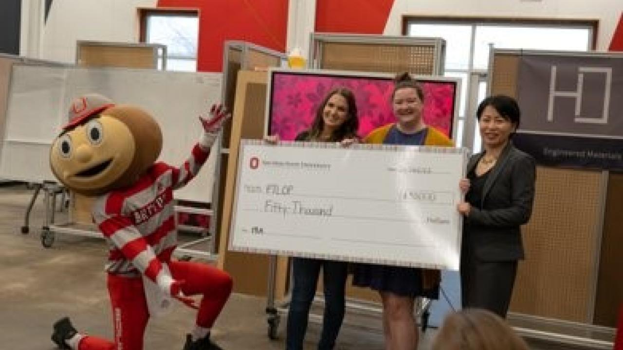 Image For the Love of Primates at pitch finale with check, Brutus and Grace Wang